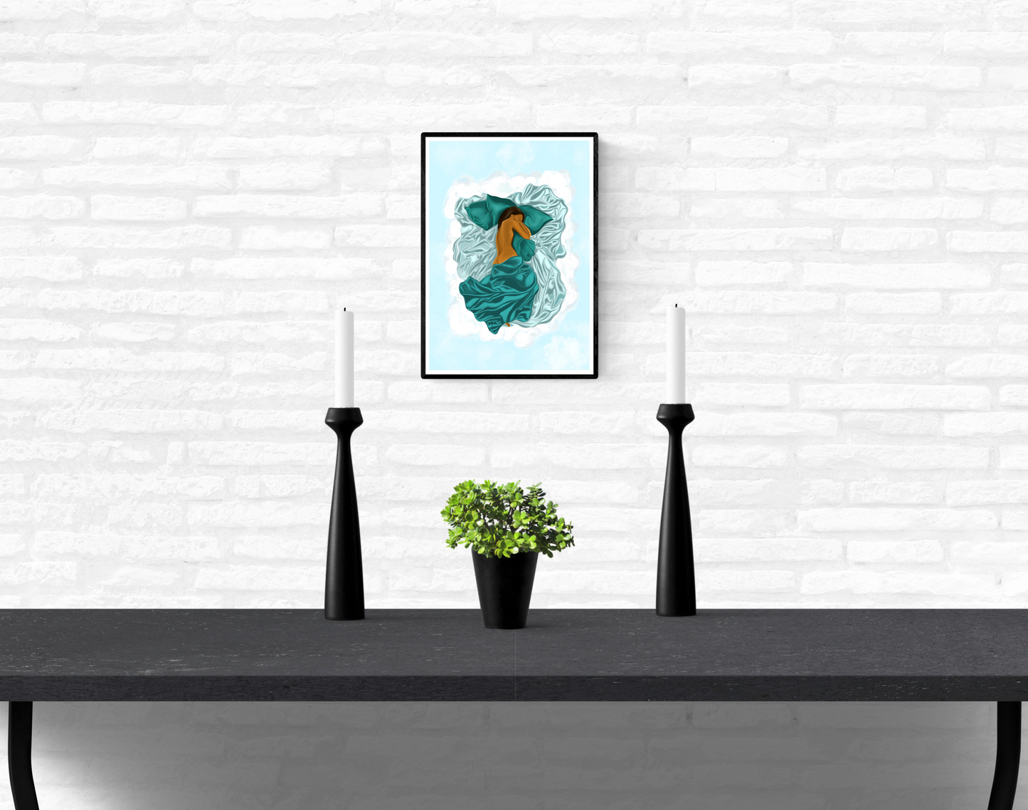 Framed artwork hanging on a white brick wall in a home