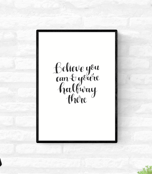 Framed wall quote print with the words “Believe you can and you’re halfway there” in black and white colour