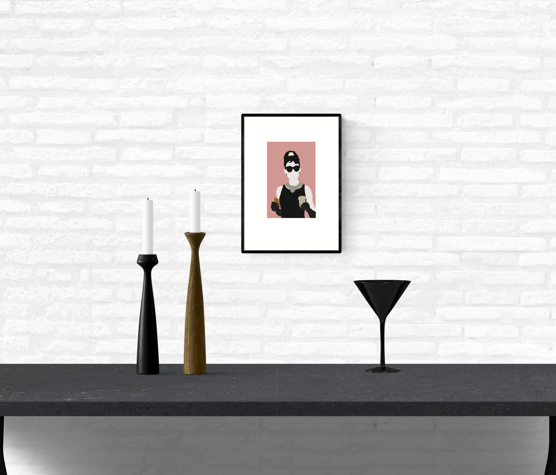 Wall art print mounted on an interior white brick wall of Holly Golightly eating breakfast in front of Tiffany’s jewellery store