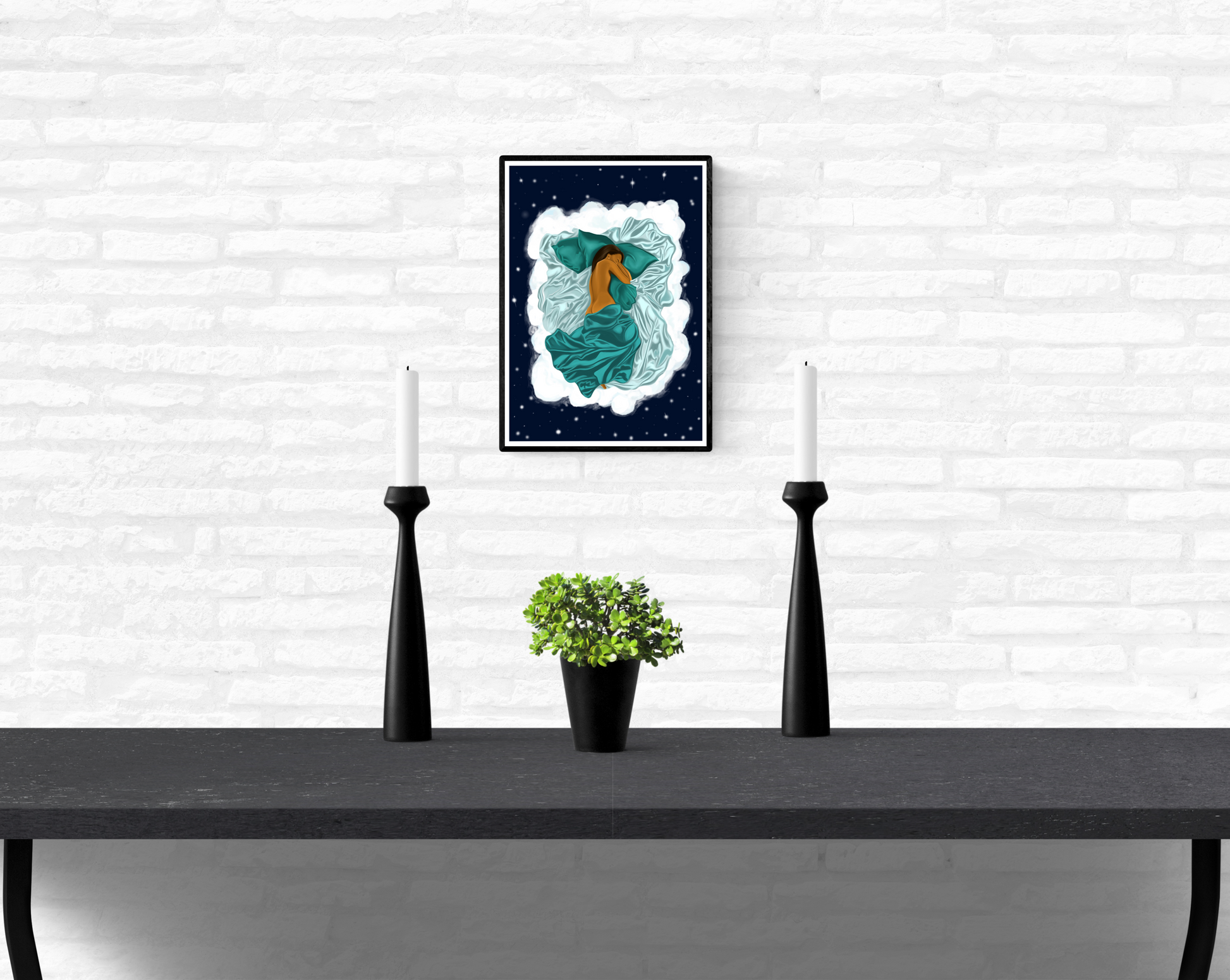 Framed artwork hanging on a white brick wall in a home