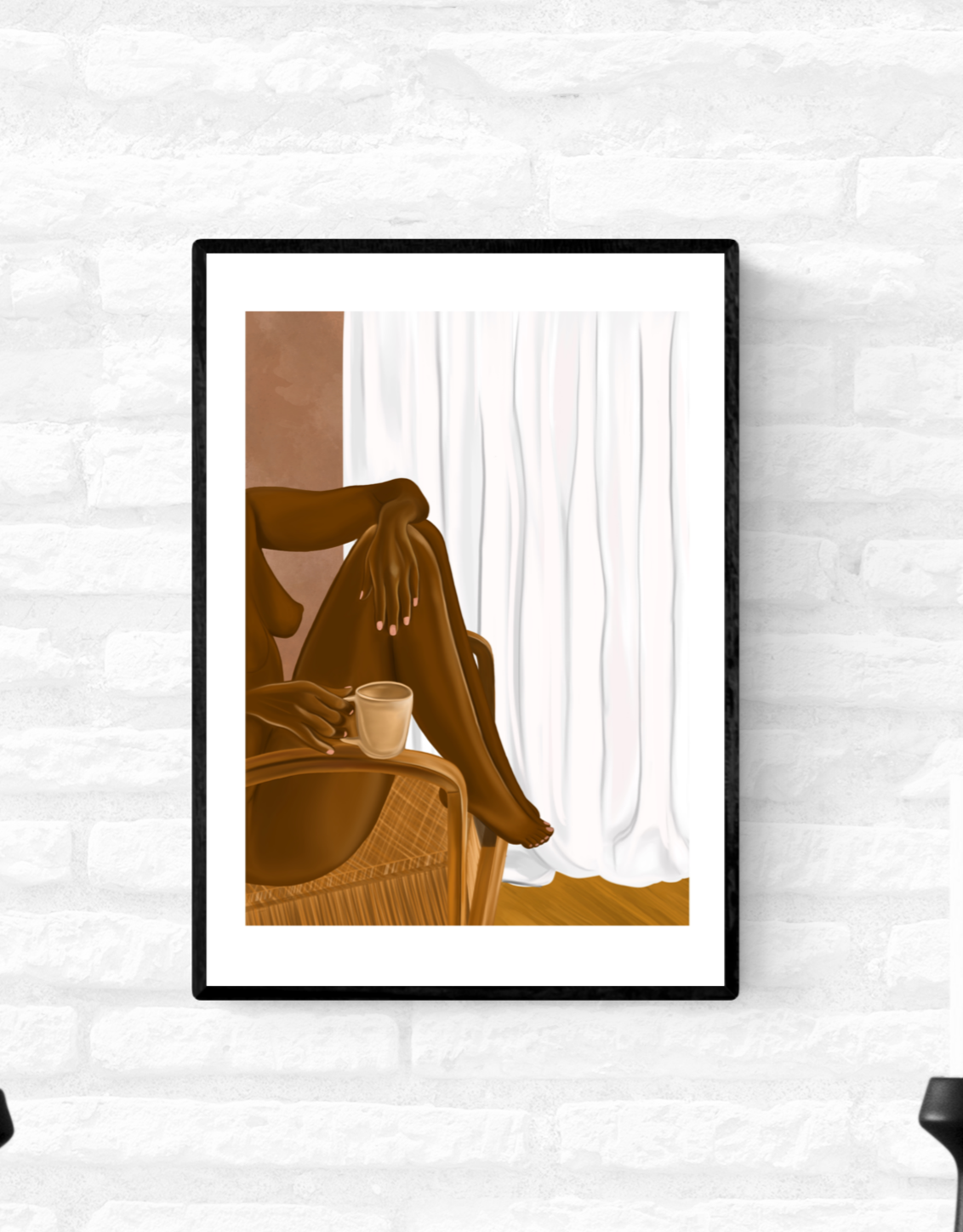 Framed wall art print of a nude black woman sitting in a chair with her feet up and a cup of tea