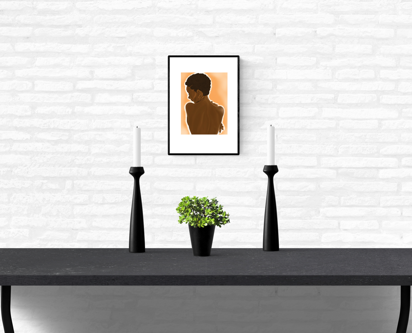 Art Illustration of a black woman’s nude back, framed and mounted on an interior white brick wall
