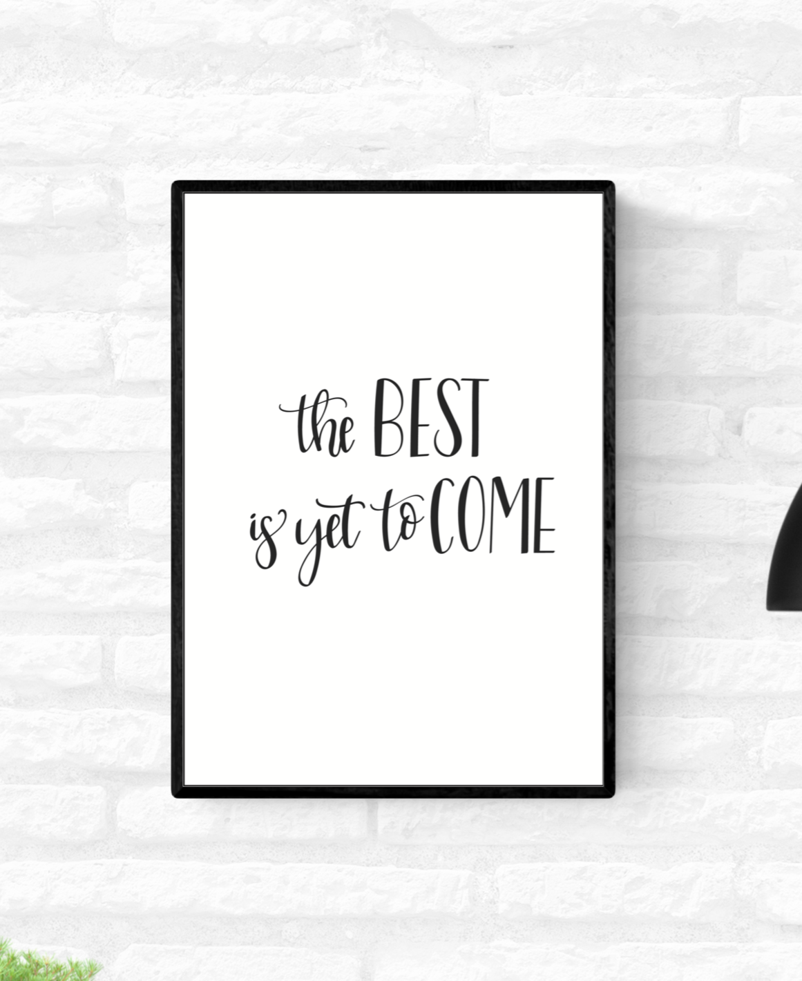 Framed wall quote print with the words “The best is yet to come”, in black and white colour