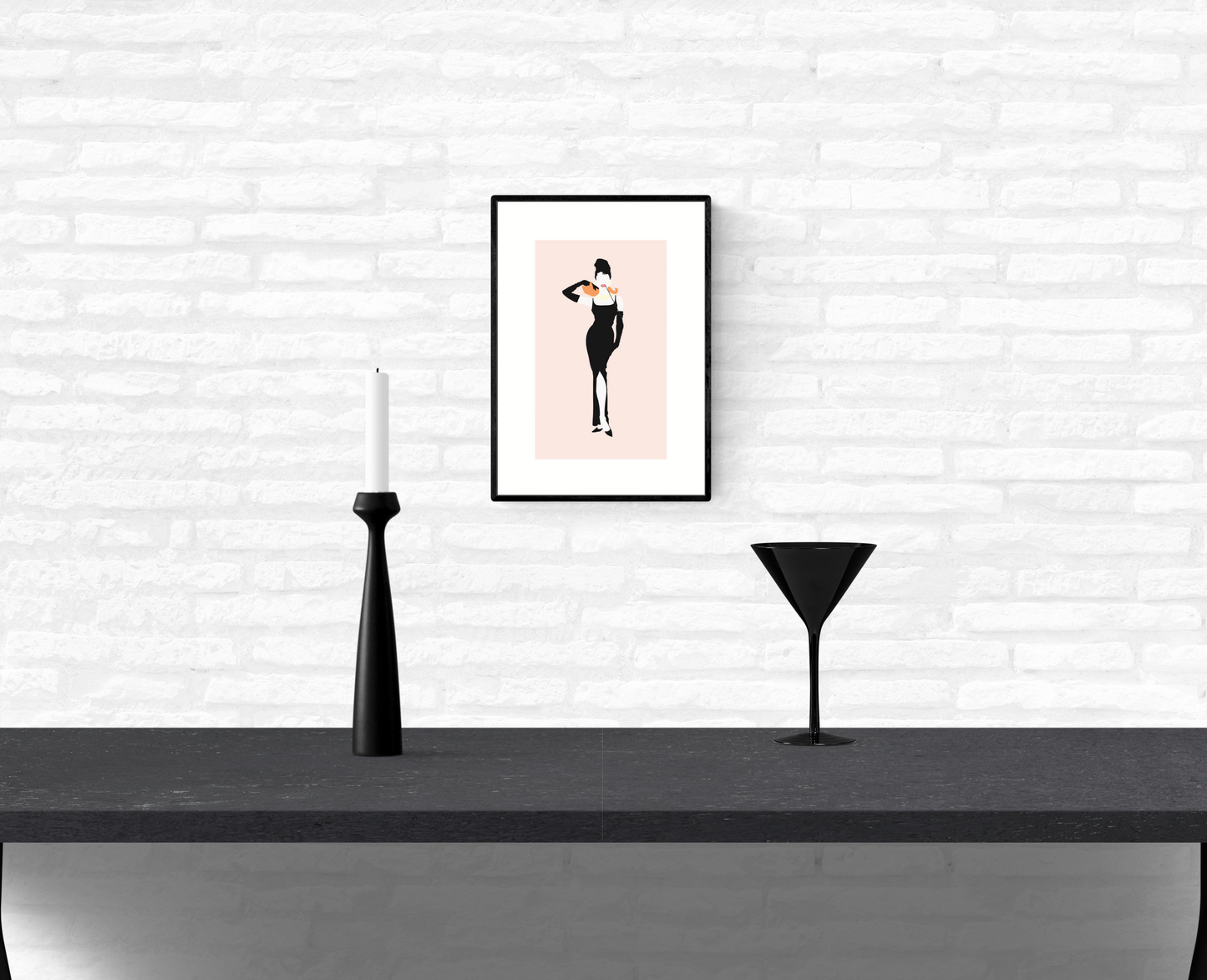 Wall art illustration print of Holly Golightly and her Cat hanging on a home’s interior white brick wall, above a table